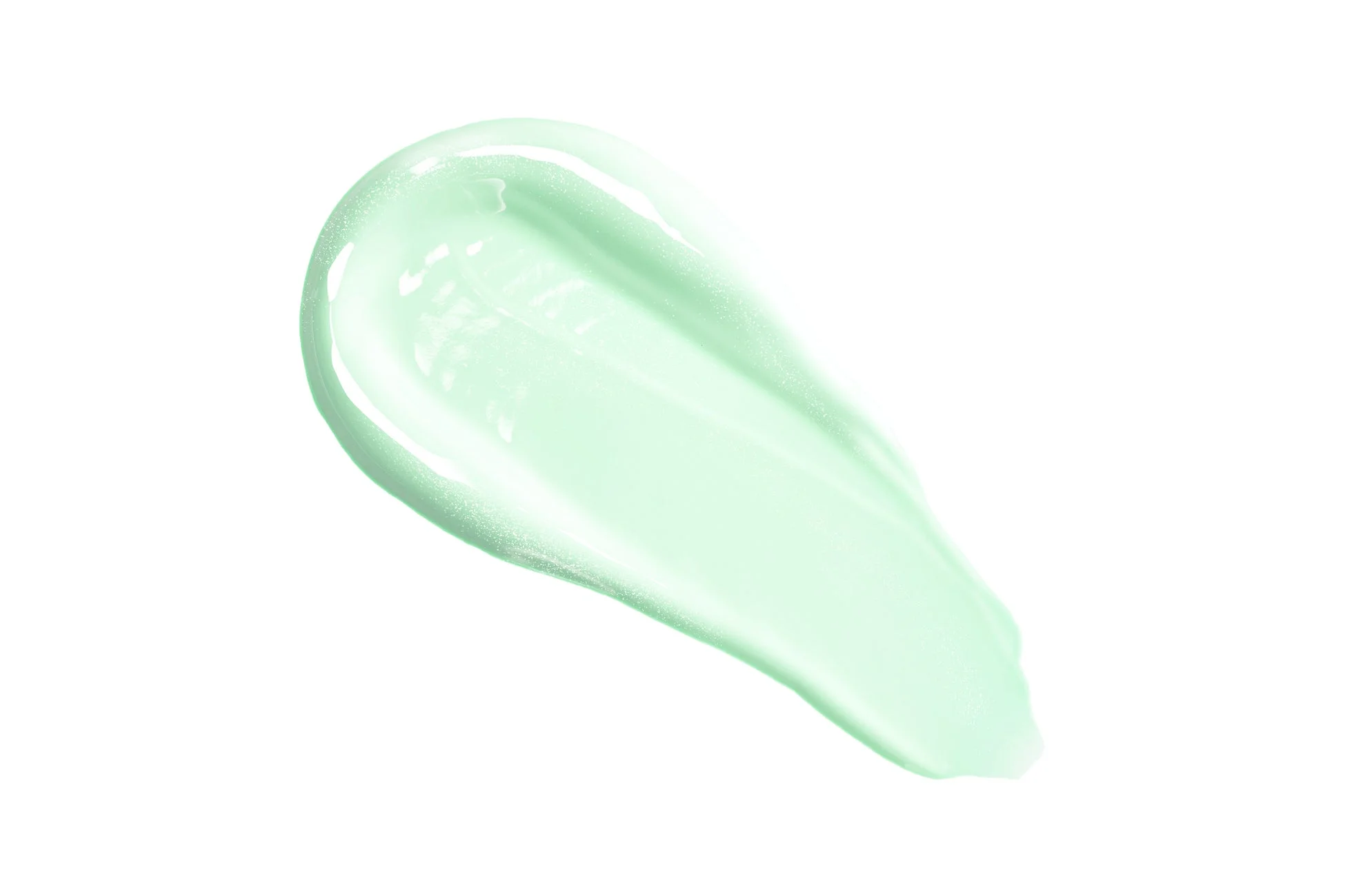 白い背景に、淡いミントグリーンのジェル状またはクリーム状の化粧品が一度塗られた状態を捉えた画像です。光沢があり、滑らかな質感が特徴です。
