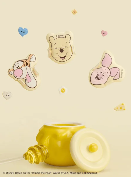 くまのプーさん、ティガー、ピグレットのクリップとハニーポット