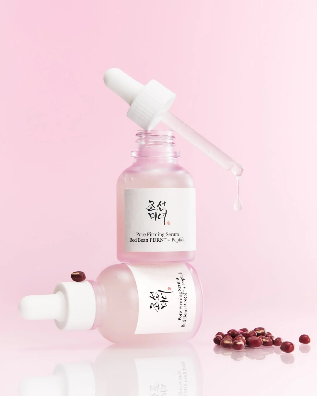 レッドビーンPDRNセラムの2本のボトルと滴